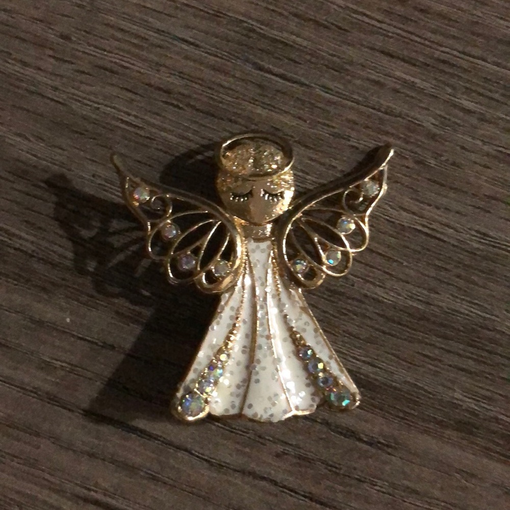 An angel brooch